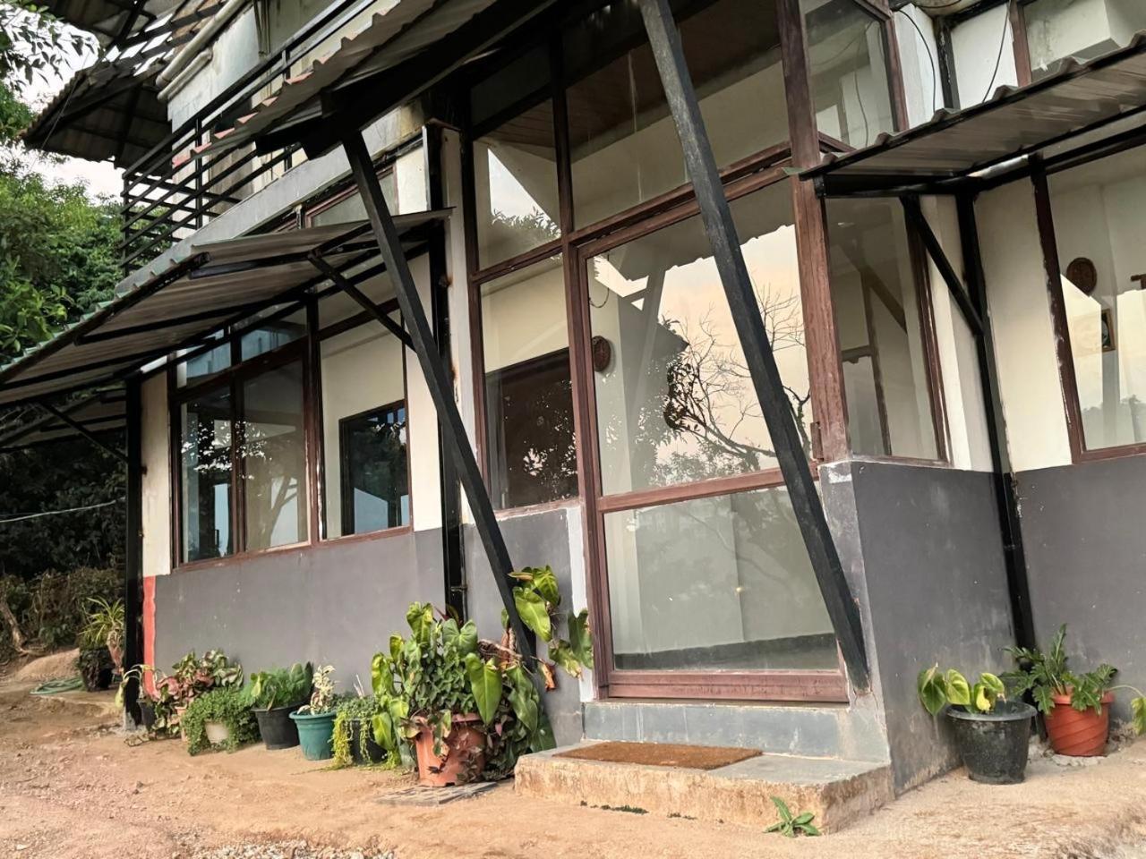 Coorg Nature Breeze Home Stay มาดิเครี ภายนอก รูปภาพ